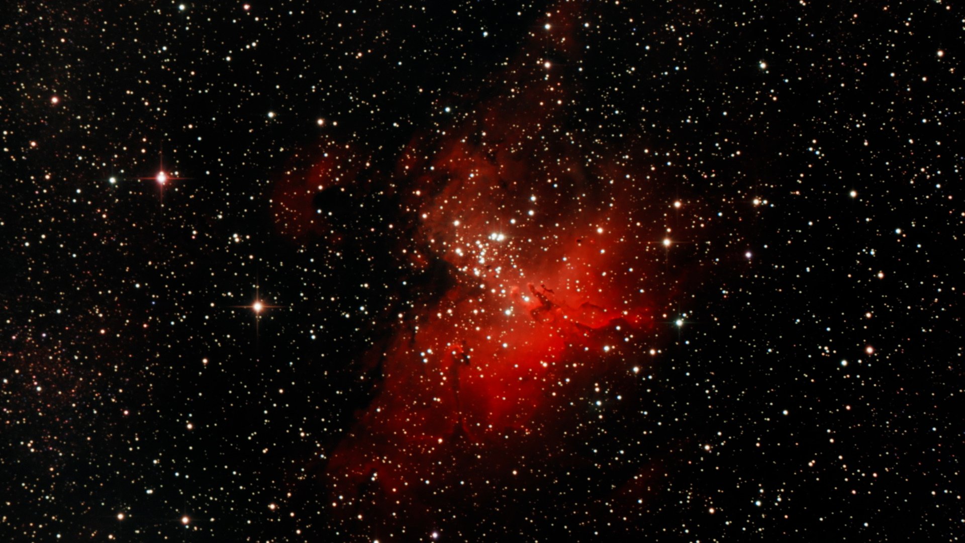 La nébuleuse de l'Aigle (M16), située dans la constellation du Serpent, et ses Piliers de la Création d'une dimension de 4 à 5 années-lumière de haut, soit environ 40 000 à 50 000 milliards de kilomètres de long (photo : Stéphane Simard)